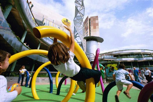 child playing on telephone tube