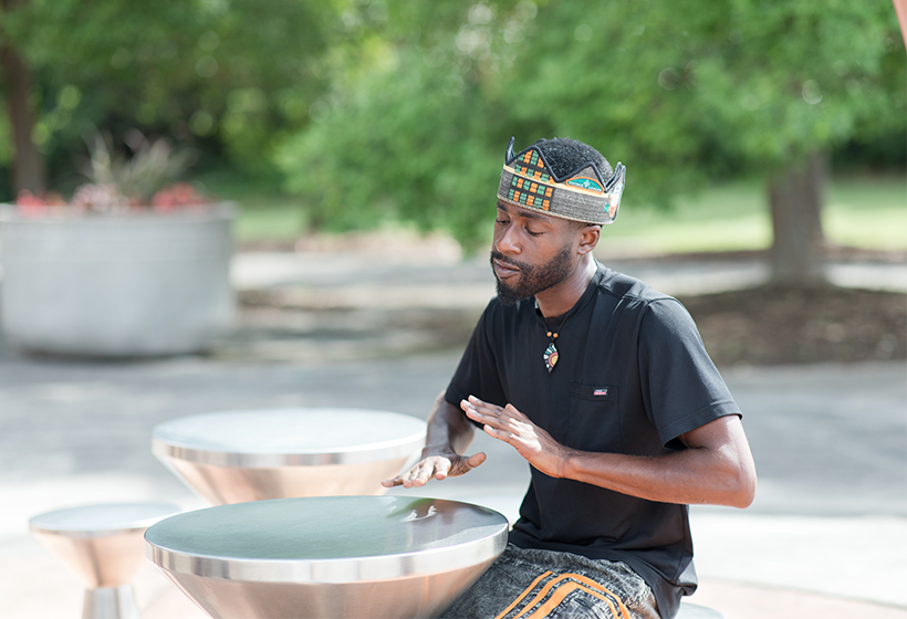 man playing drums